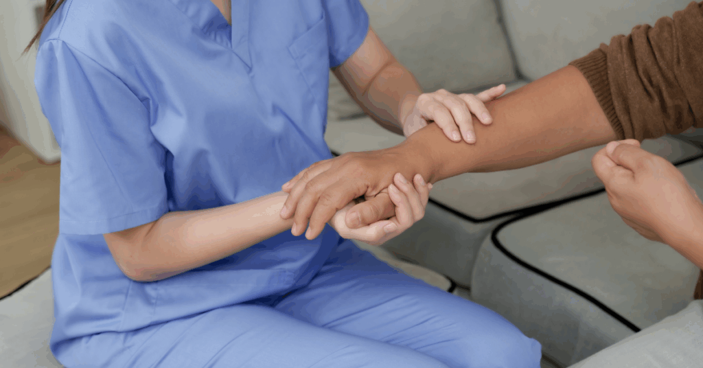Nurse helping patient with Myositis at home.